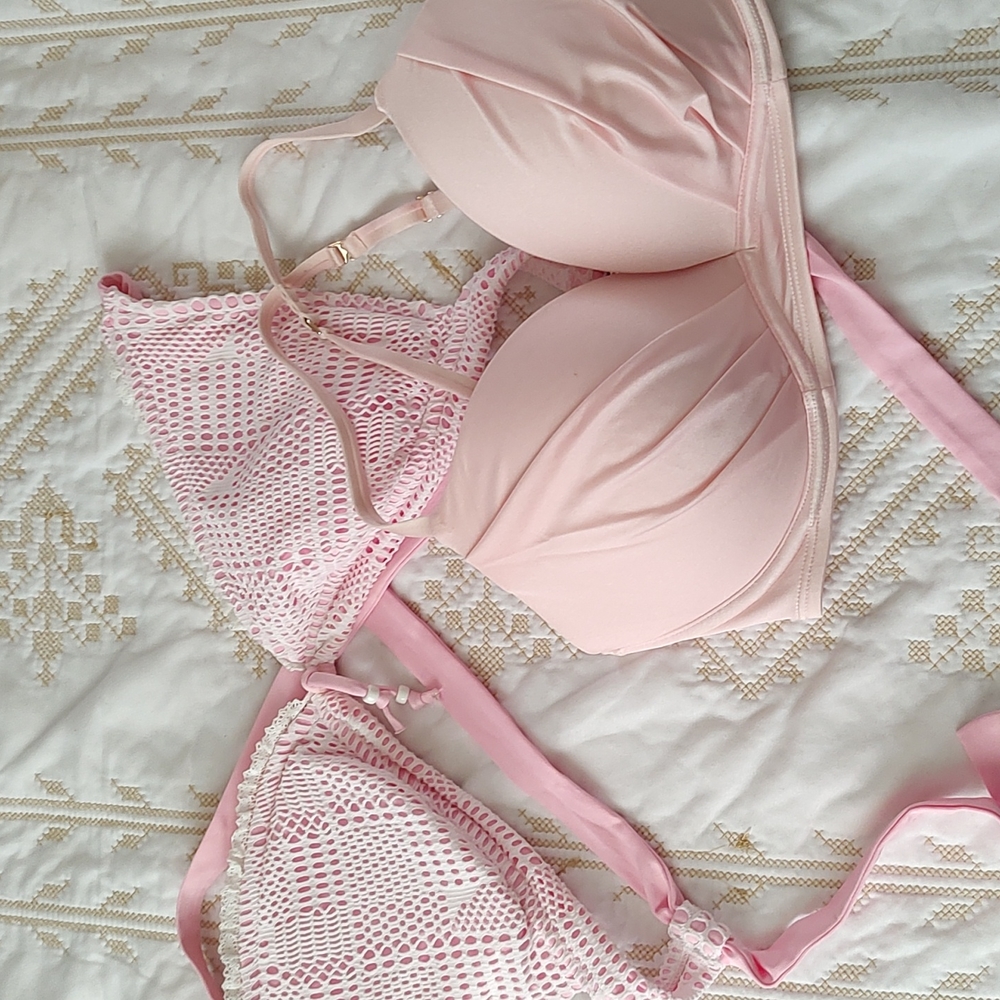 Two pale pink bikini tops